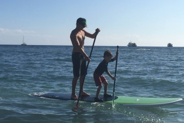 a person riding a surf board in the water